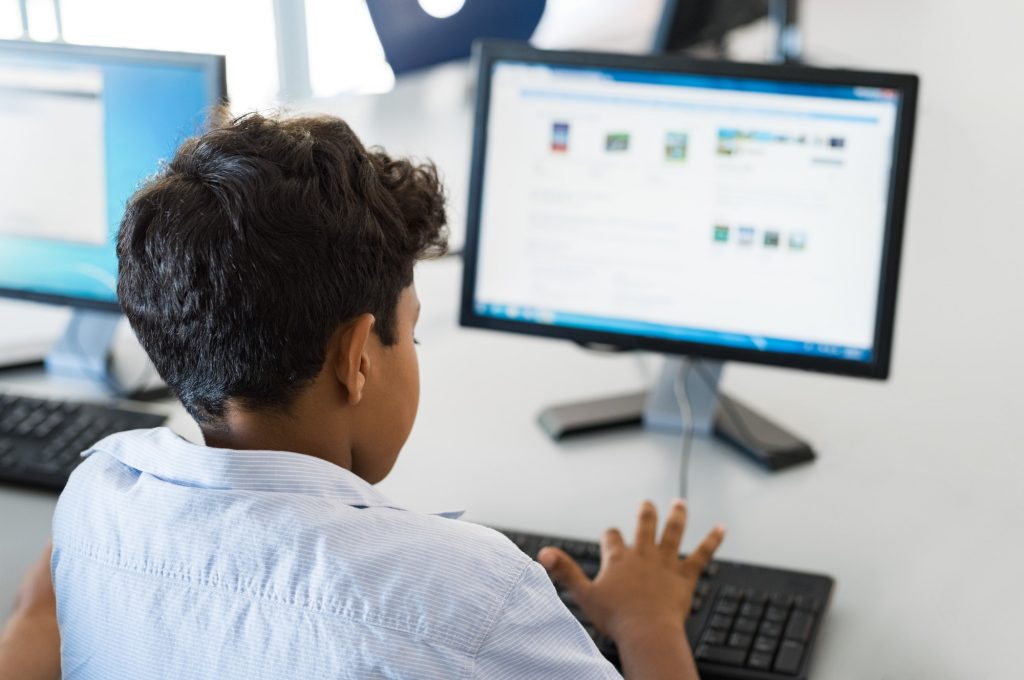 Young boy using computer