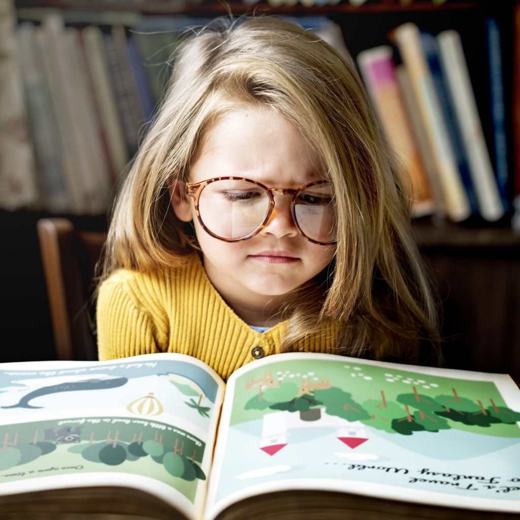 Adorable Cute Girl Reading Storytelling Concept