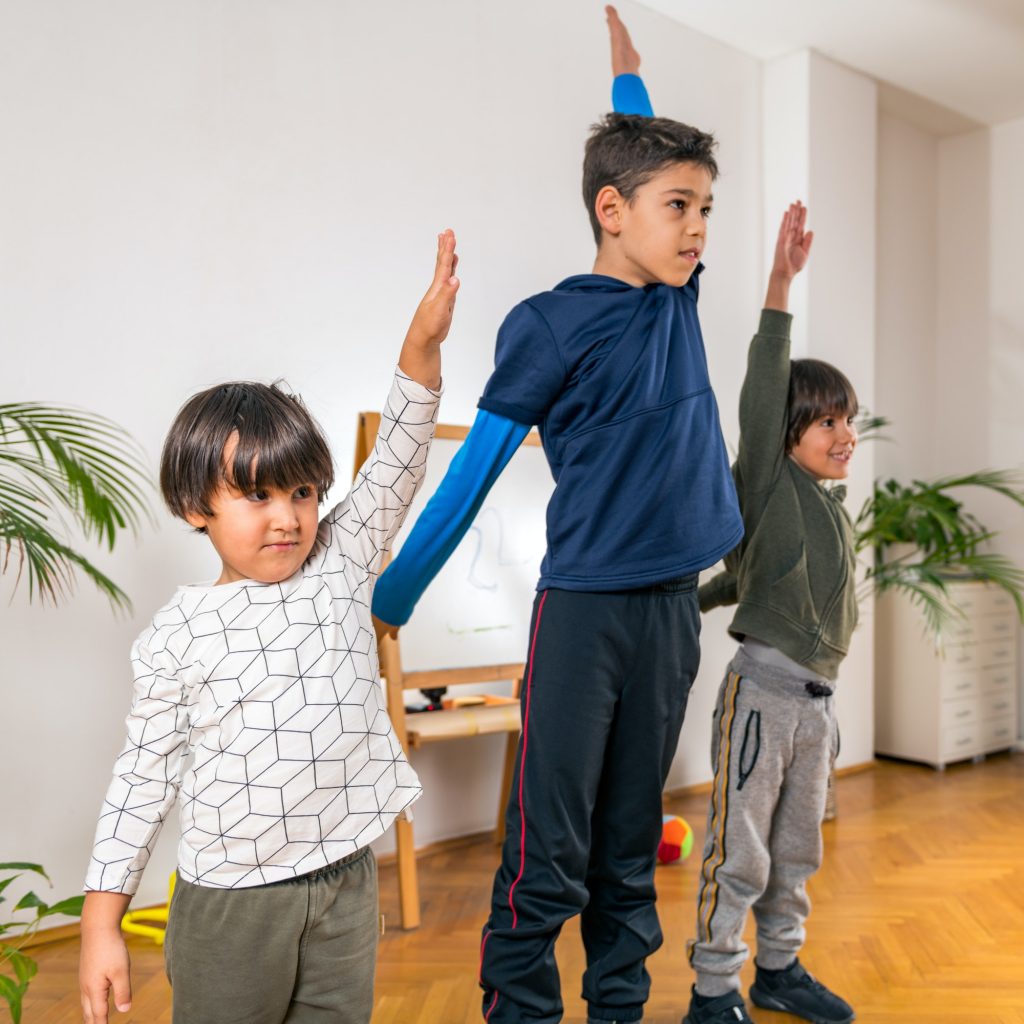 Boys Exercising in Kindergarten